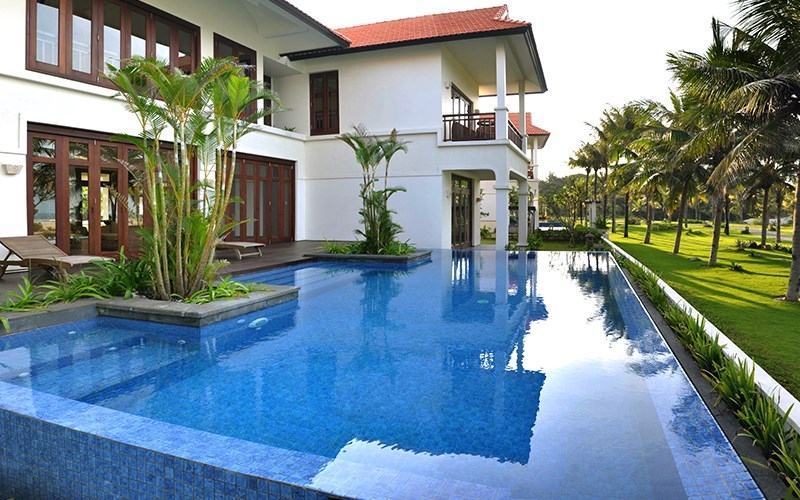 Spacious swimming pool area at Furama Resort & Villas Danang