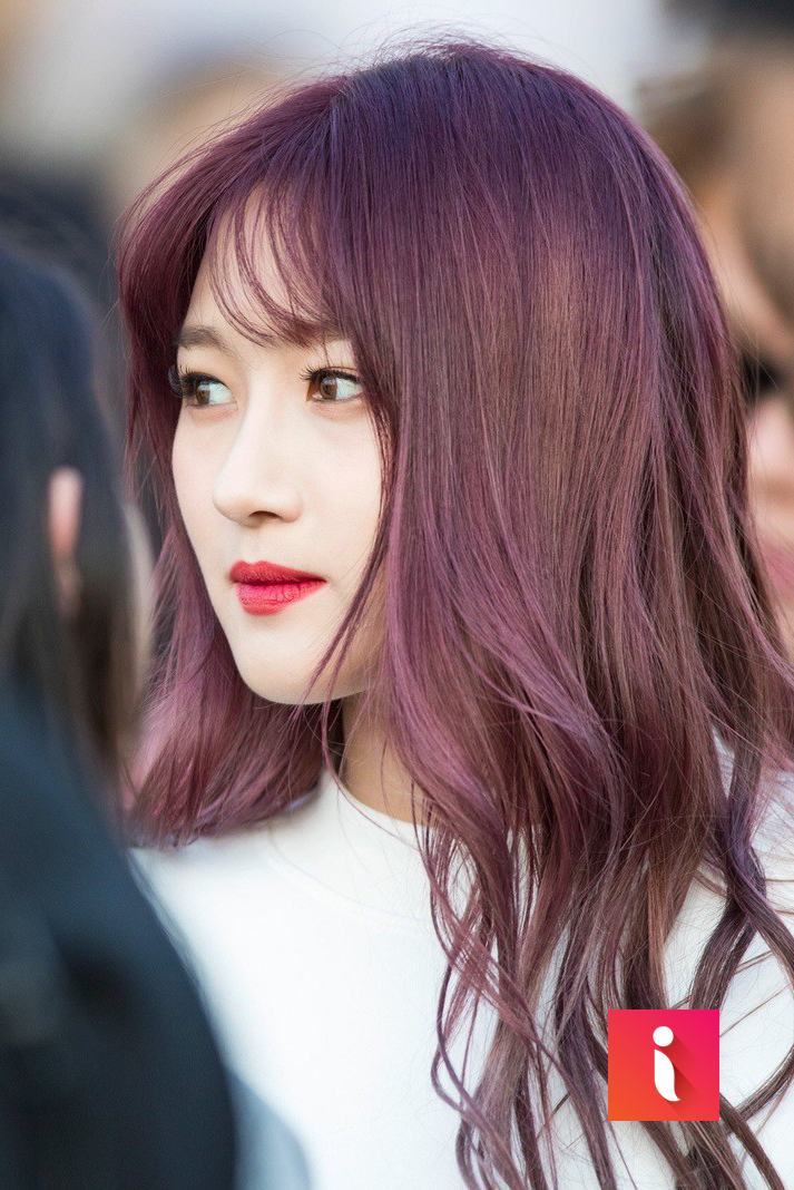 Purple light brown combined with wavy hair