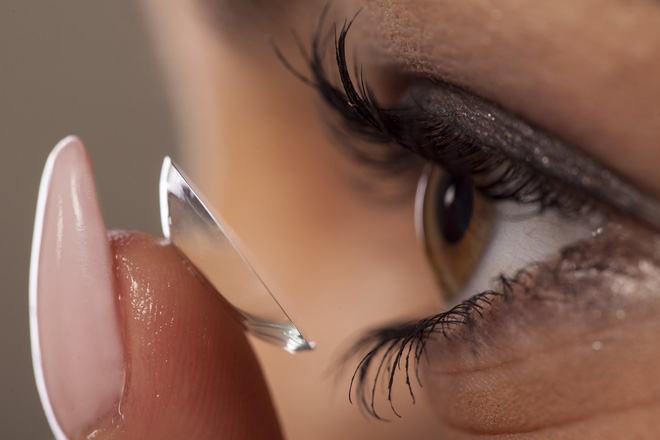 Remove contact lenses before instilling eye drops