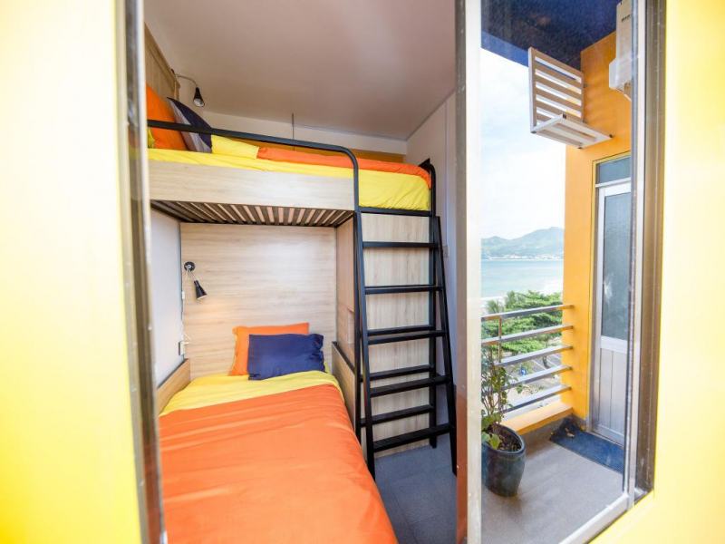 With a contrasting color scheme, "orderly mess", the hostel is right from the outside