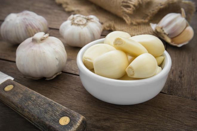 folk remedies for menstrual cramps with garlic