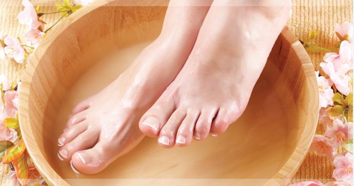 Soak your feet in warm salt water to relieve pain