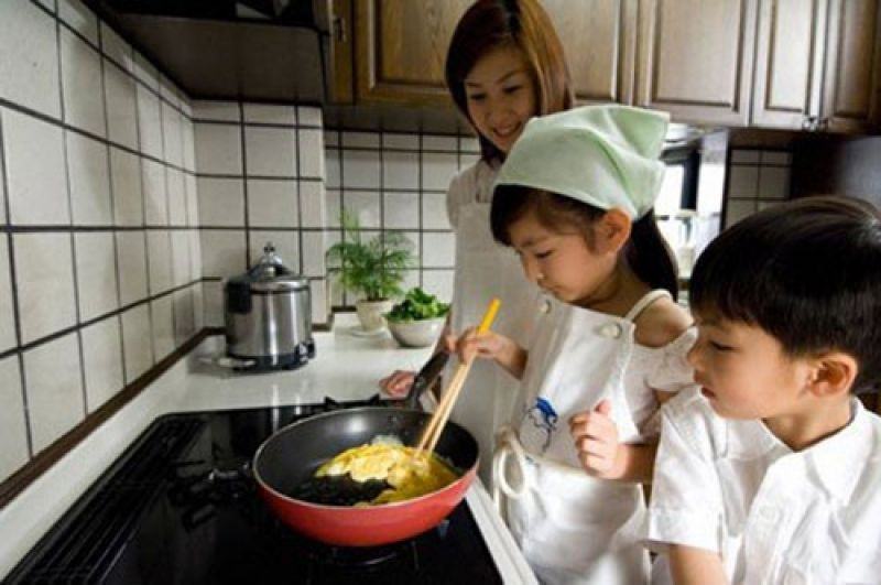 Japanese babies are often taught how to prepare food by their mothers.