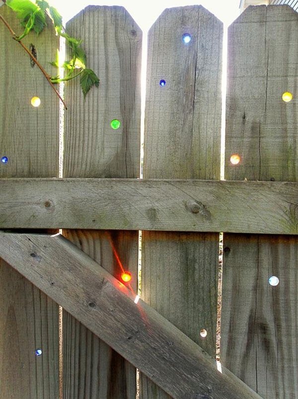 Artistic fence with colorful marbles