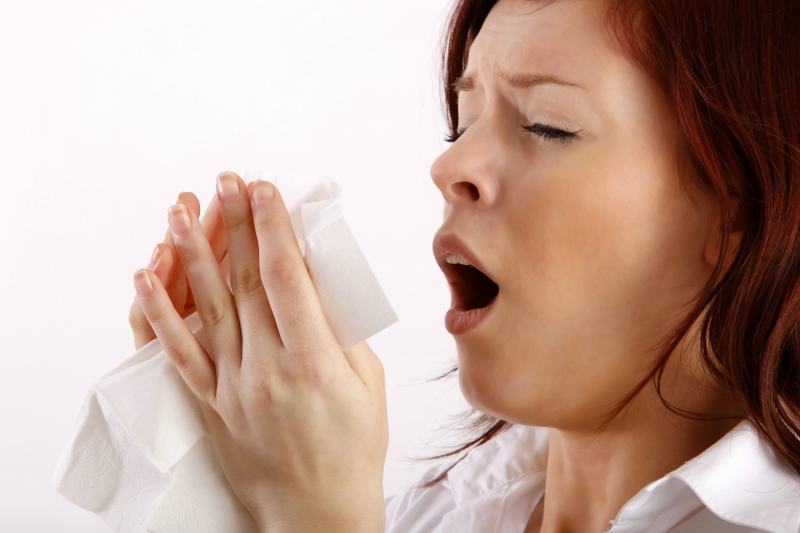 Push your tongue behind your teeth to stop a sneeze