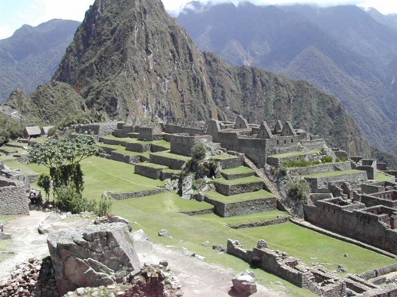 The fortress is located on a massive mountain in the Andes