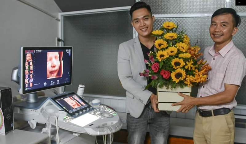 Doctor Ha Tan Ngoc (on the right)