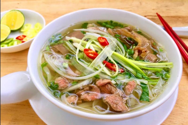 The bowl of pho is full of deliciousness