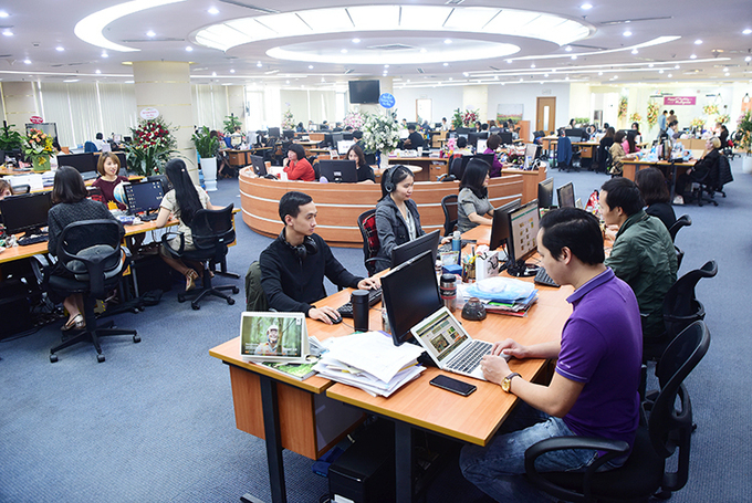 Open workspace at Hanoi headquarters of VnExpress Newspaper